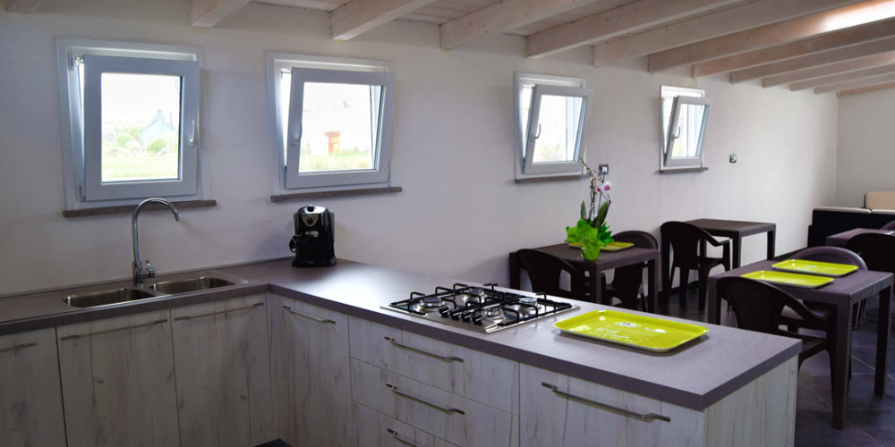 salone con cucina condivisa